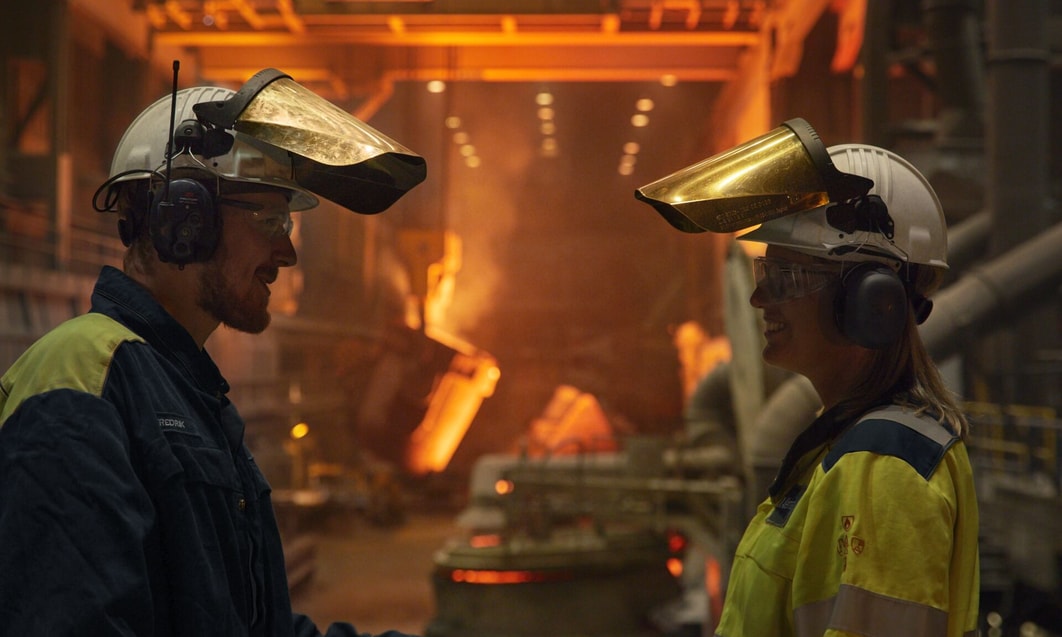 a person and person wearing hard hats and helmets