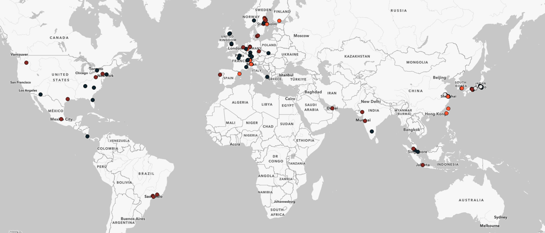 a map of the world with red and black dots