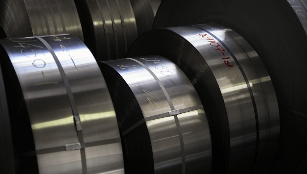 rolls of steel coils in a warehouse