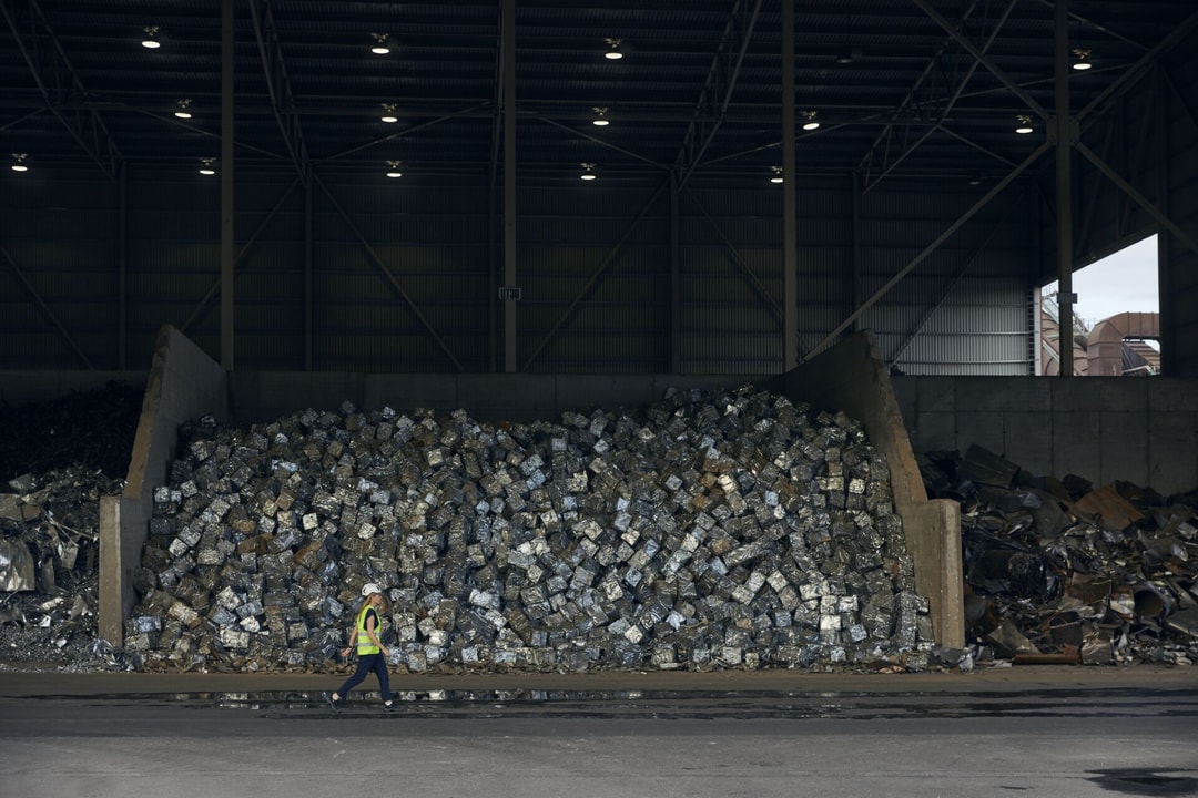 a person walking in a large warehouse