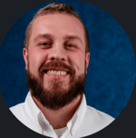 a person with a beard smiling