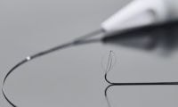 A medical device showing a nitinol basket on the end
