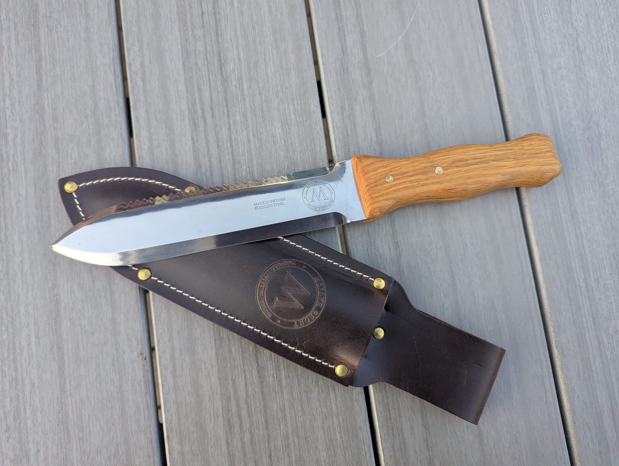 a knife with a leather sheath