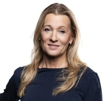 en person med blont hår