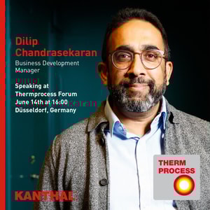 en person med glasögon och skägg