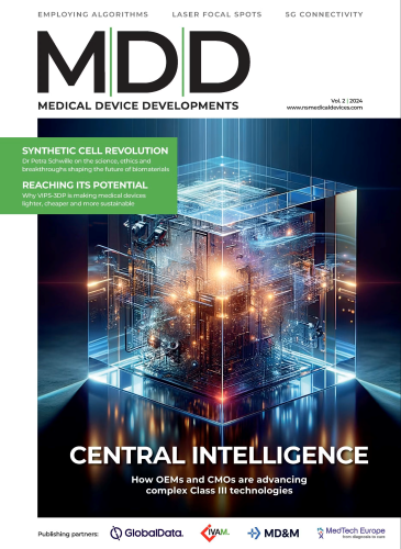 a magazine cover with a cube of electronic components