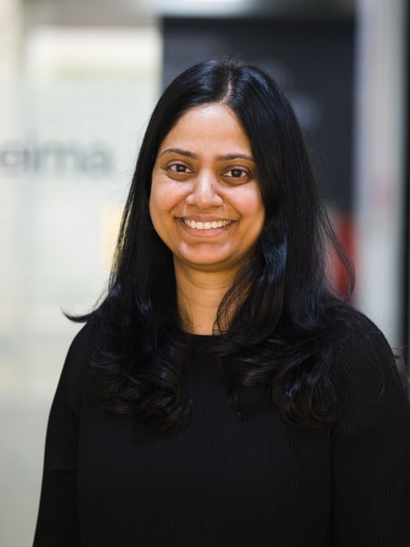 en person som ler mot kameran