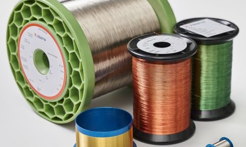 a group of spools of wire