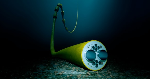 ett grönt rör med en lång kabel