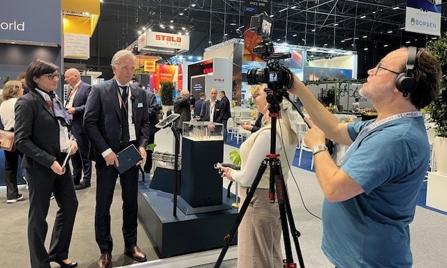 a person standing in front of a camera