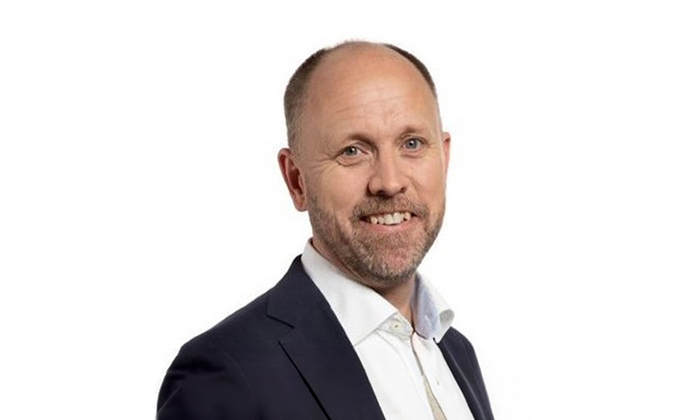 en person i en kostym