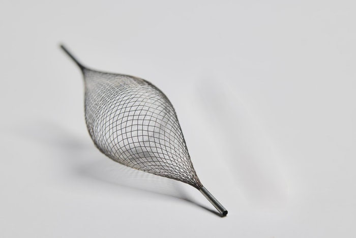 a net on a white surface
