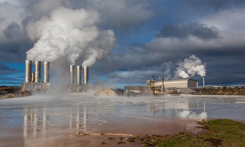 a factory with smoke coming out of it