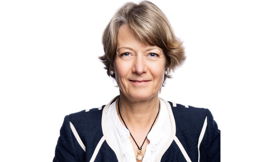 en person som ler mot kameran