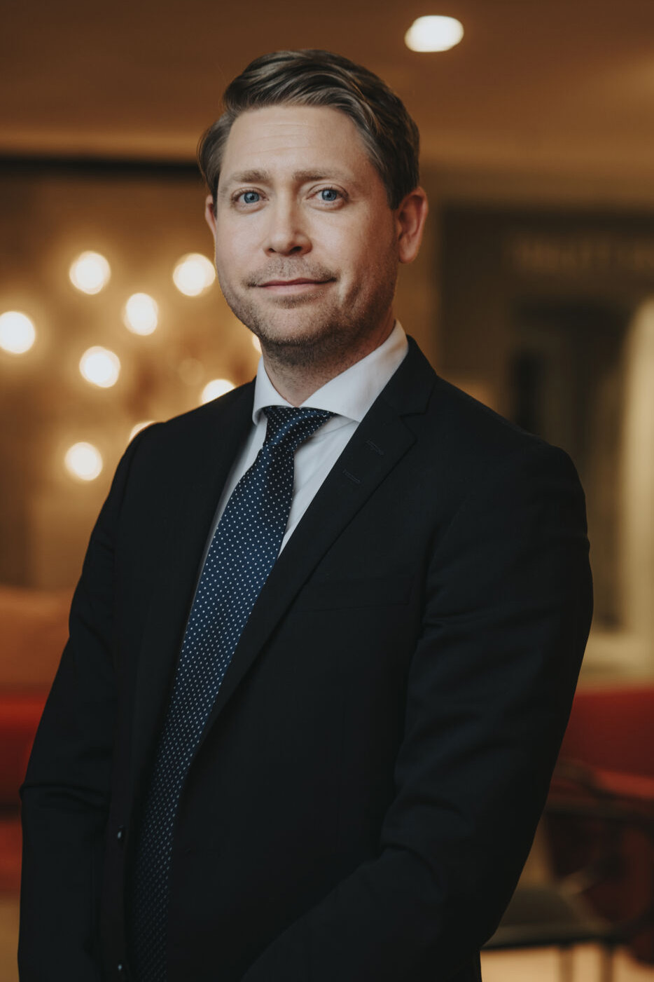 a person in a suit and tie